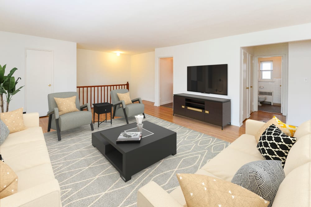 Spacious living room with hardwood flooring at Duncan Hill Apartments in Westfield, New Jersey