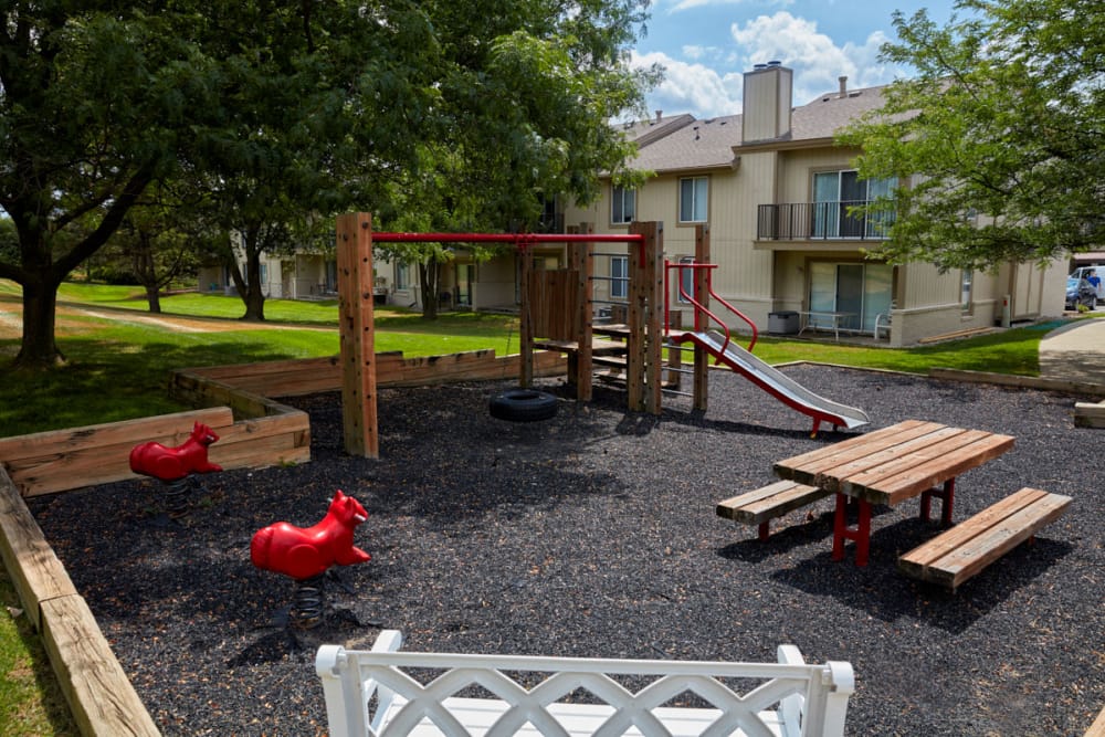 Playground and picnic area at Briar Cove Terrace Apartments in Ann Arbor, Michigan