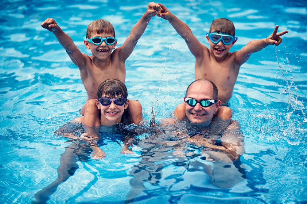 Family swimming at Avilla Gateway in Phoenix, Arizona