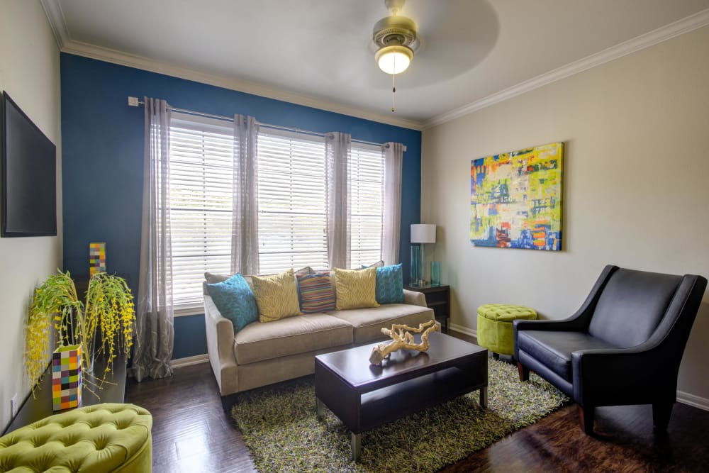 Living Room with large windows and tons of natural light at The Quarry Townhomes in San Antonio, Texas