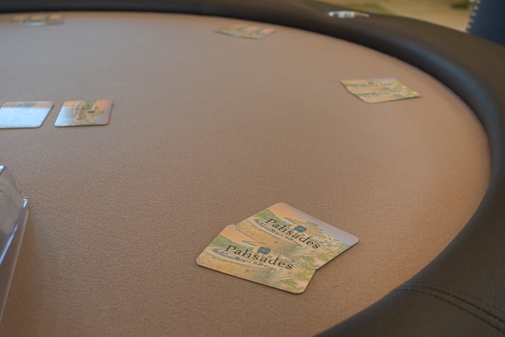 Poker table in newly renovated game room