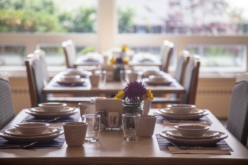 Place settings in community dining room at Cap Sante Court Retirement Community in Anacortes, Washington