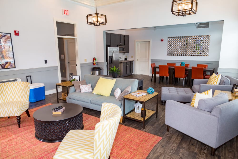 A community lounge with plenty of comfortable seating at Traditions at Mid Rivers in Cottleville, Missouri*