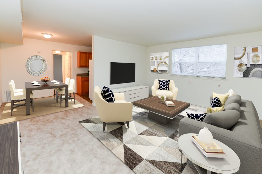 A living room that is great for entertaining at Woodcrest Apartment Homes in Dover, Delaware