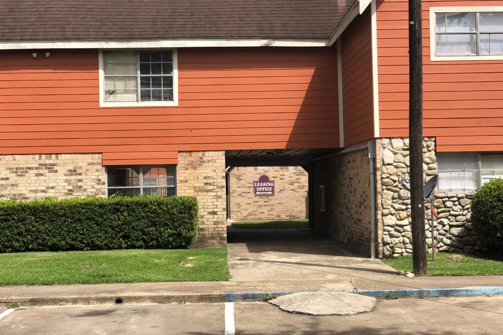 Sign for the leasing office at Cambridge in the Groves in Groves, Texas