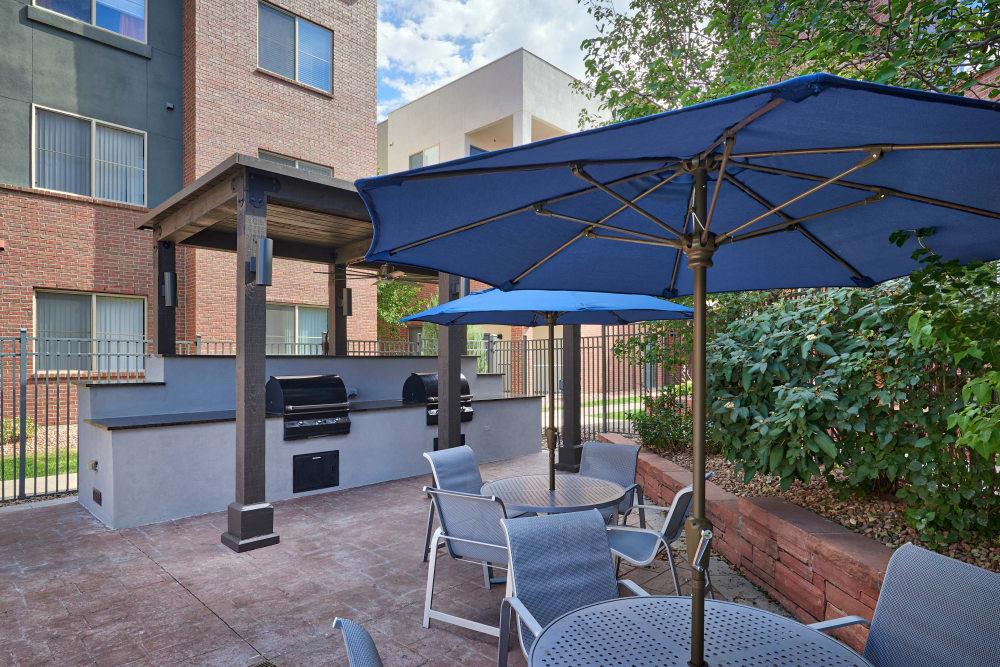 Covered poolside BBQ with lounge area