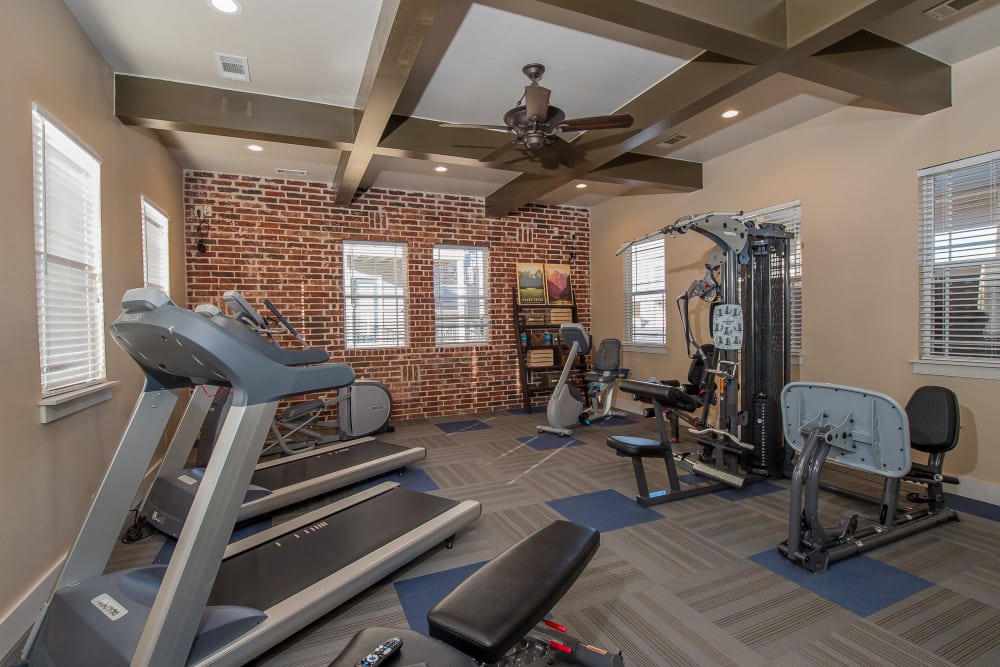 Fitness center at Cottages at Tallgrass Point Apartments in Owasso, Oklahoma