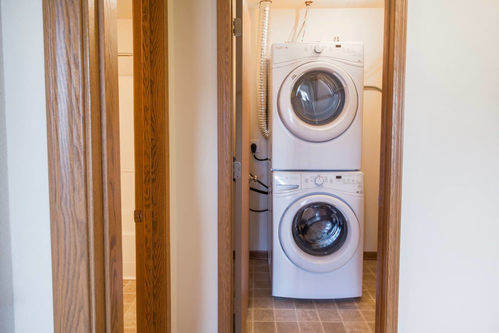 Stacked washer and dryer in an apartment at West Towne in Ames, Iowa