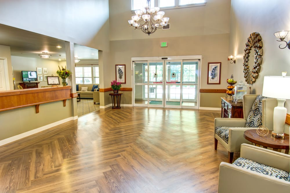 Wood floor lobby at Bridgeport Place Assisted Living in University Place, Washington.