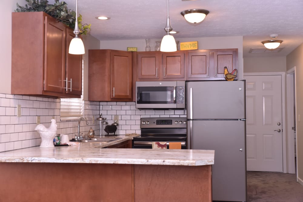 Apartment kitchen at Ashford Place Health Campus in Shelbyville, Indiana