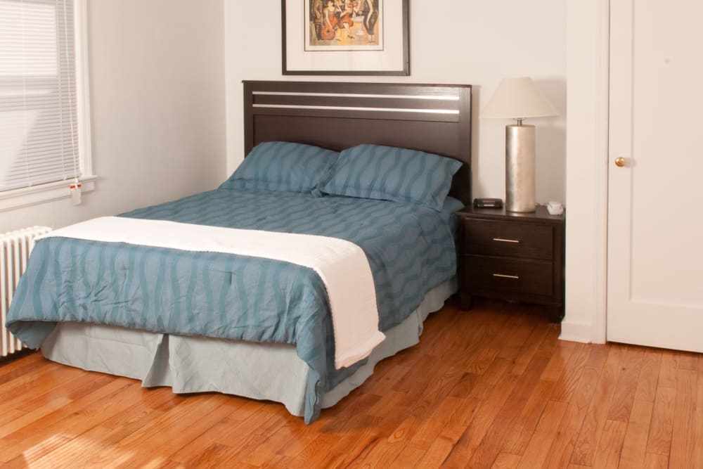 Cozy bedroom at Warner Village Apartments in Trenton, New Jersey