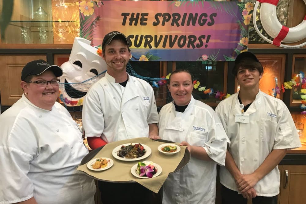 Chefs at The Springs of Mooresville in Mooresville, Indiana holding meals for residents
