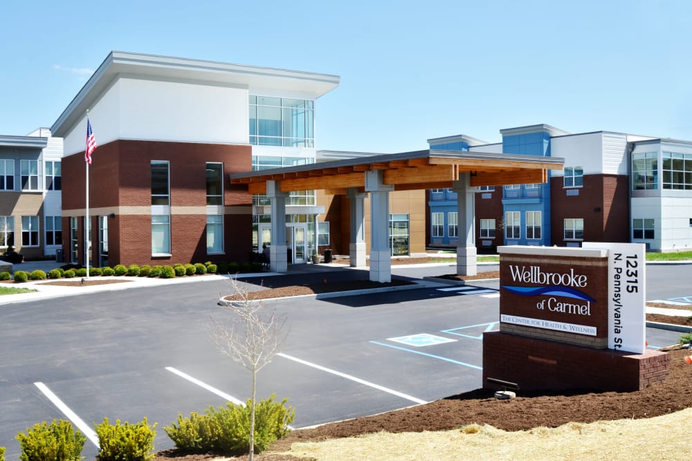 Building exterior and main entrance at Wellbrooke of Carmel in Carmel, Indiana