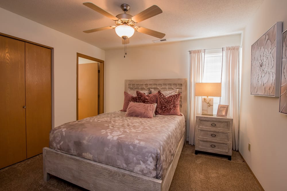 Bright bedroom at Huntington Park Apartments in Wichita, Kansas