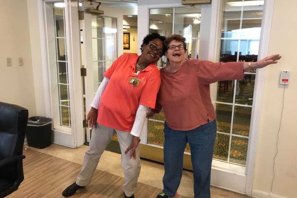 Senior resident and nurse smiling at Franciscan Health Care Center in Louisville, Kentucky