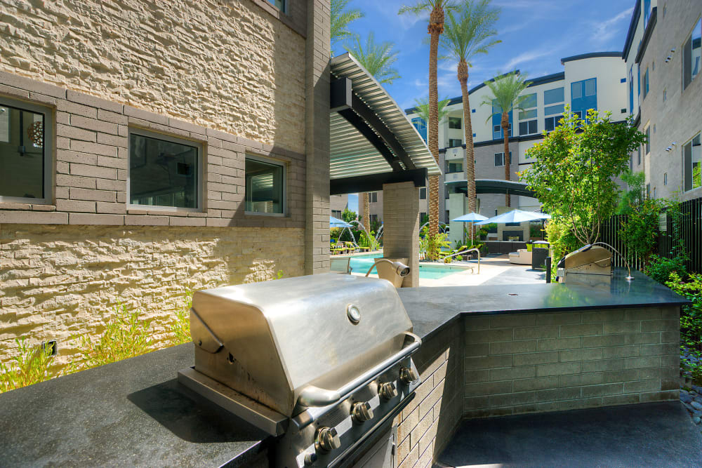 Barbecue area with gas grills at Level at Sixteenth in Phoenix, Arizona