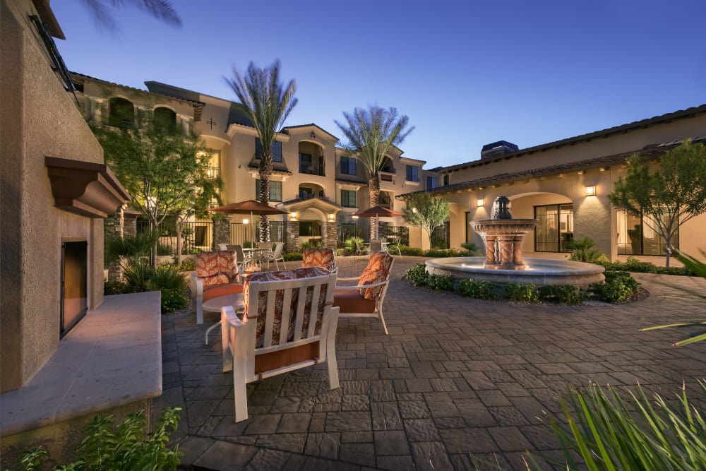 Courtyard with a fountain at dusk at San Milan in Phoenix, Arizona