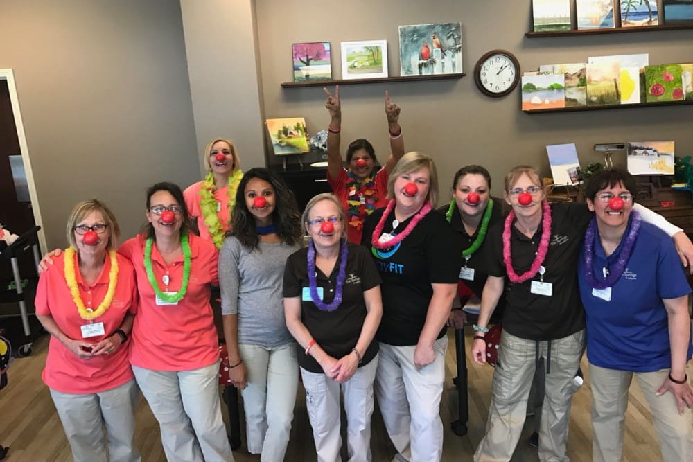 Silly staff posing for a photo in clown noses at The Springs at Lafayette in Lafayette, Indiana