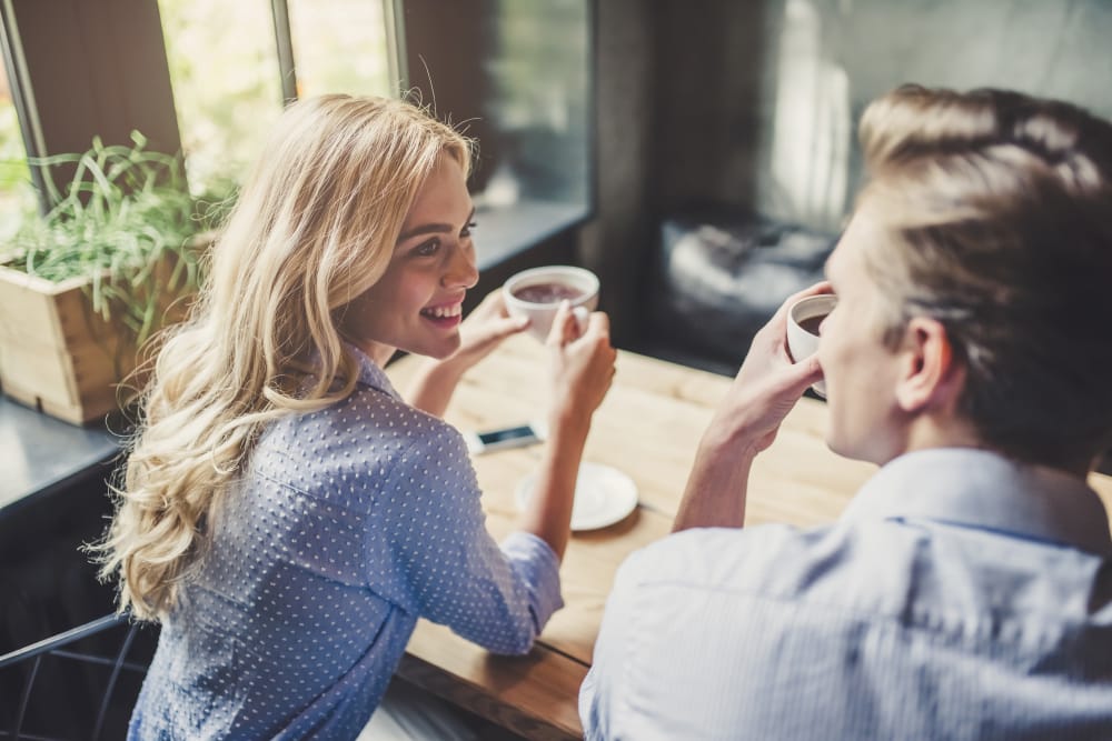Residents having coffee in their new home at The Reserve at Gilbert Towne Centre in Gilbert, Arizona