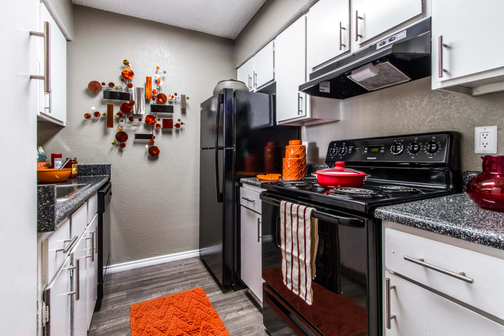 Fully equipped kitchen at Sausalito Apartments in College Station, Texas