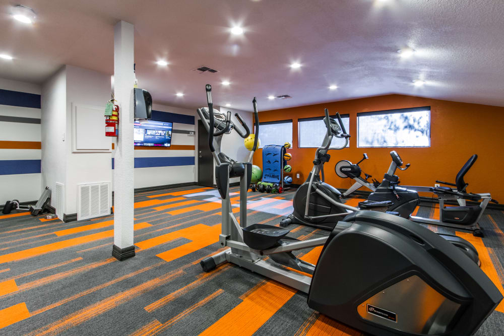 Modern fitness center at Sausalito Apartments in College Station, Texas