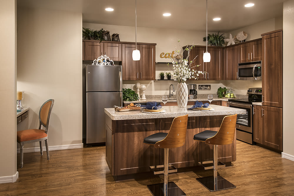 Beautiful open-concept floor plan with hardwood floors in model home at San Valencia in Chandler, Arizona