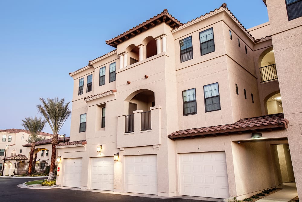 Exterior view of resident building with available garages at San Marquis in Tempe, Arizona