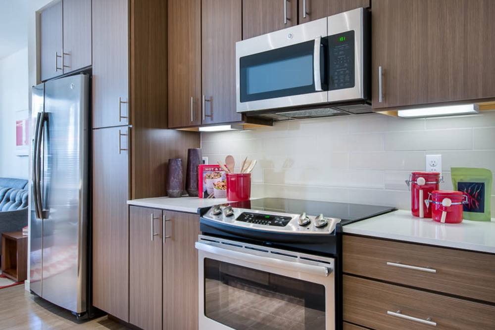 Kitchen with stainless-steel appliances at Elevate in Englewood, Colorado