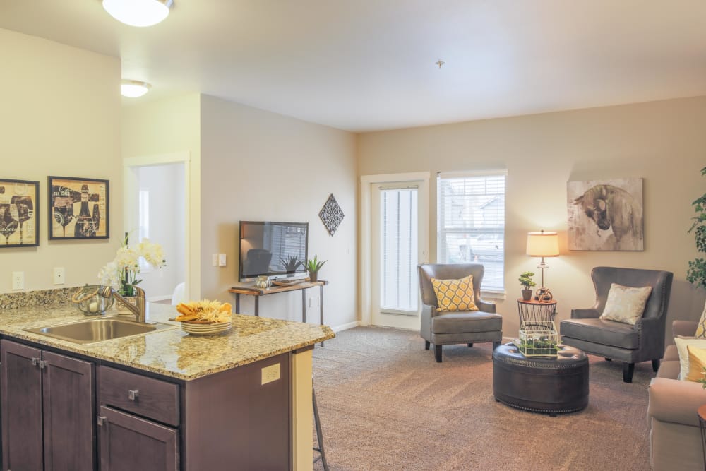 warm lighting in the open floor plan at Keizer Station Apartments in Keizer, Oregon