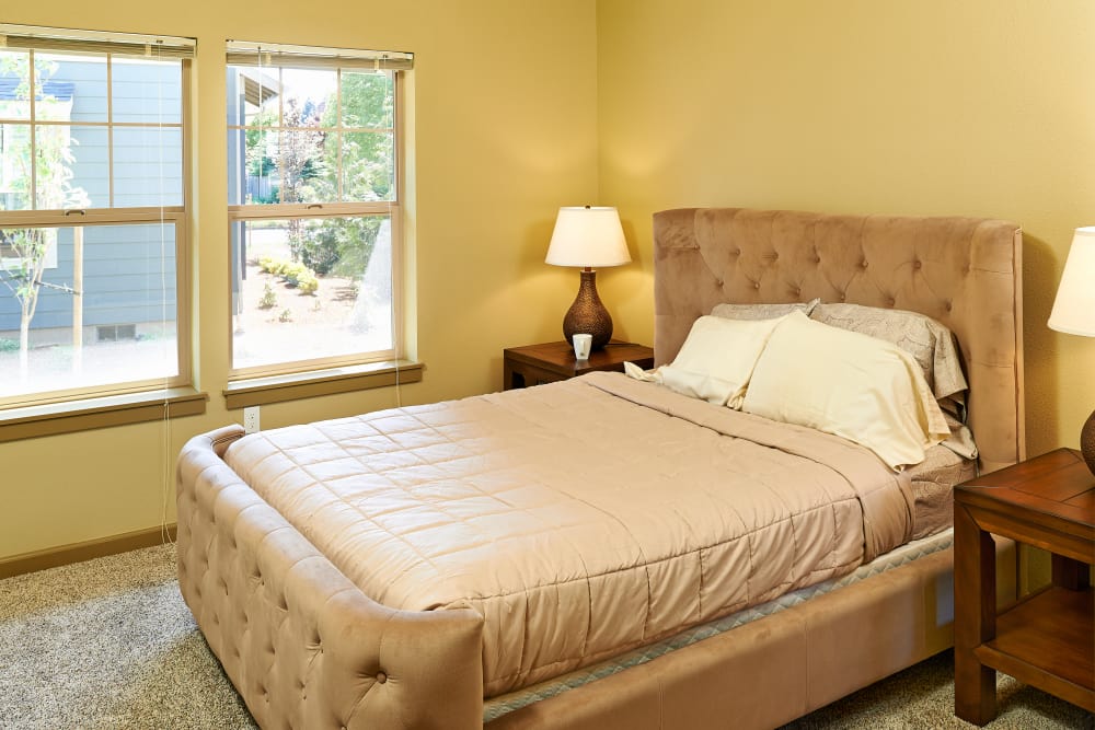 Bright bedroom at Heritage Meadow Apartments in Eugene, Oregon