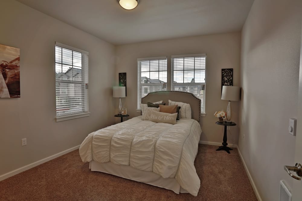 a cozy bedroom at The Fairway Apartments in Salem, Oregon