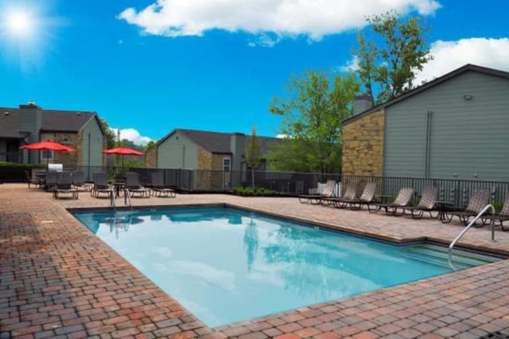 An outdoor swimming pool at Goldelm at Metropolitan in Knoxville, Tennessee