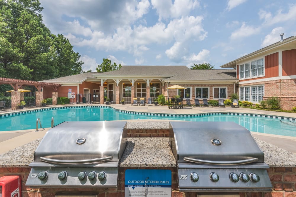 Barbecue area near the pool at 200 East in Durham, North Carolina