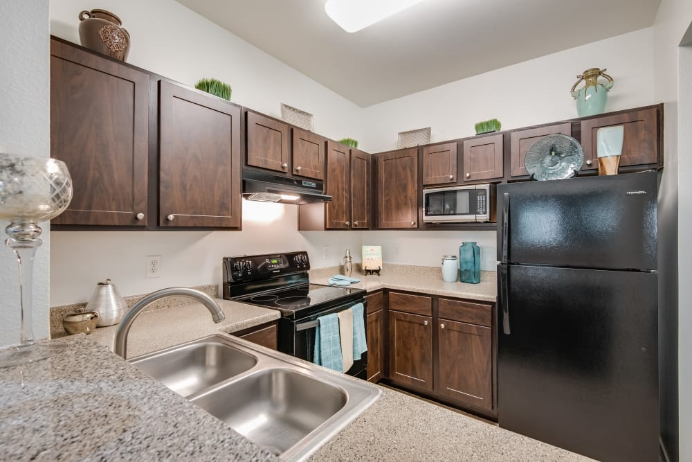 Kitchen at Ravinia Apartments in Spring, Texas