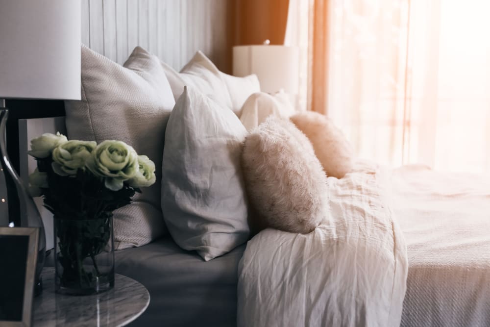 Pillows on a bed at Keystone Apartments in Madison, Wisconsin