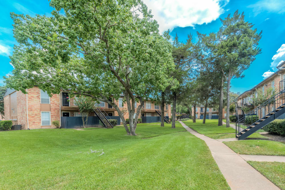 Outdoor stairs at Newport Oaks Apartments in Alvin, Texas