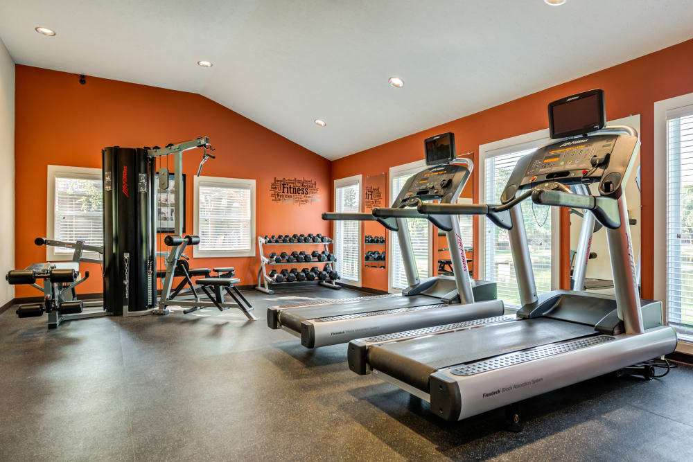 A fitness center with plenty of natural lighting at Valle Vista in Greenwood, Indiana