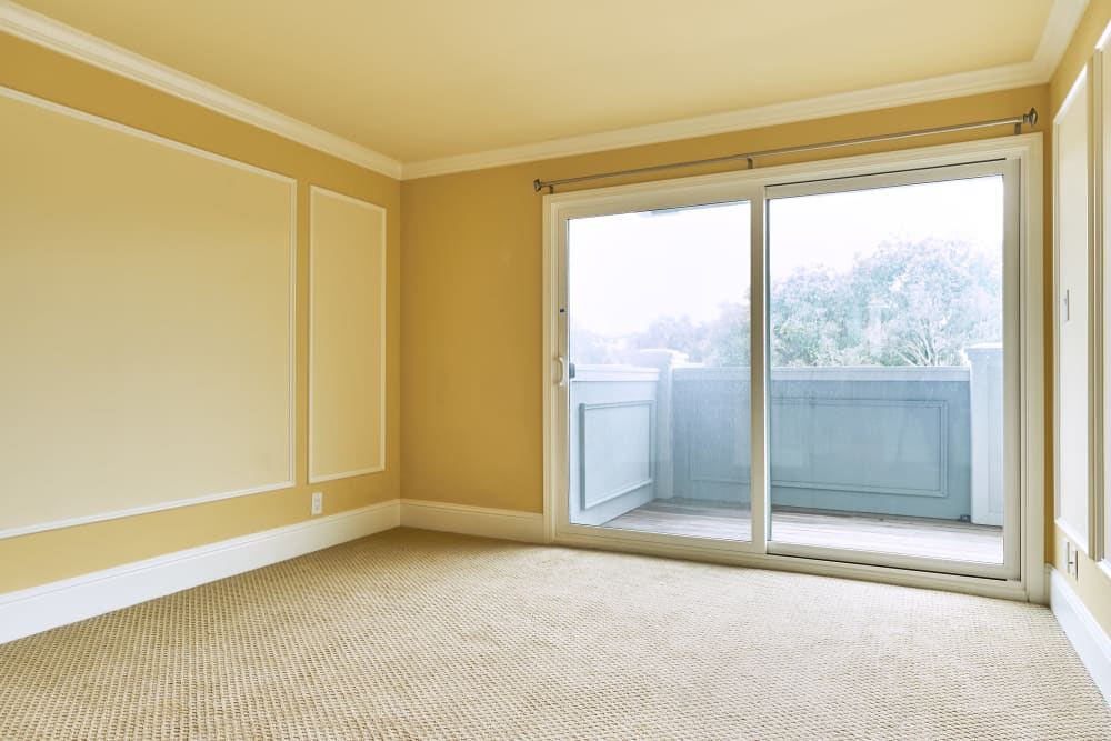 Spacious bedroom with a private balcony at Palmetto at Tiburon View in Tiburon, California