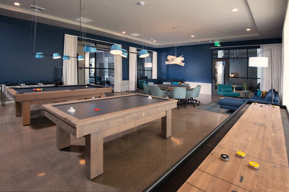Game Room with Poker Table, Foosball, Shuffleboard, and Pool Table at Sky at Chandler Airpark