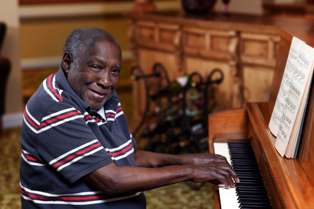 Senior playing piano