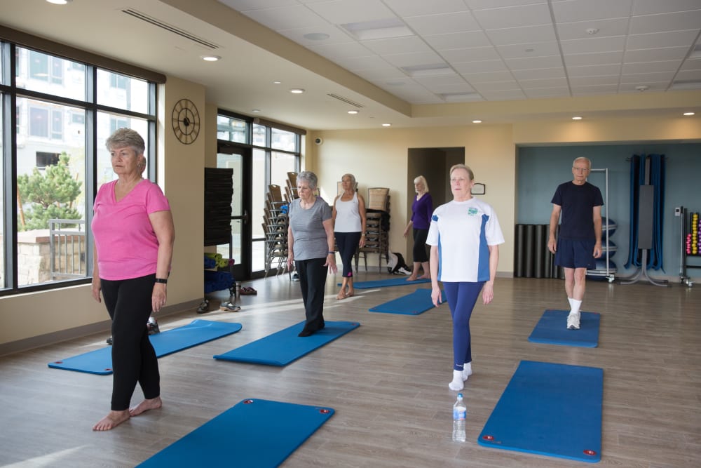 Residents beside yoga mats at Touchmark Health & Fitness Club in Meridian, Idaho