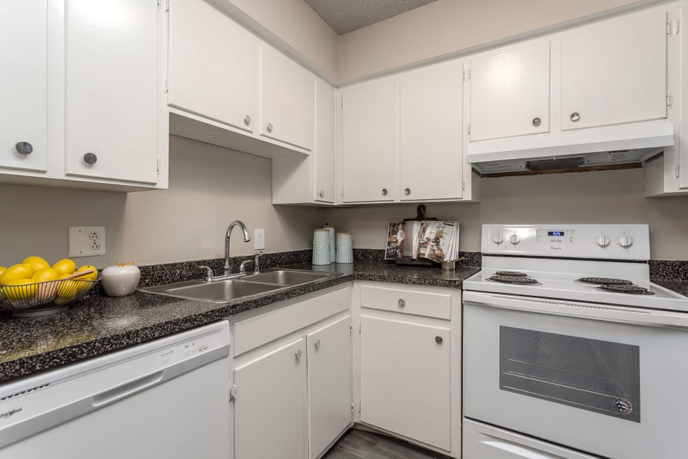 Enjoy Apartments with a Modern Kitchen at Hickory Creek Apartments & Townhomes