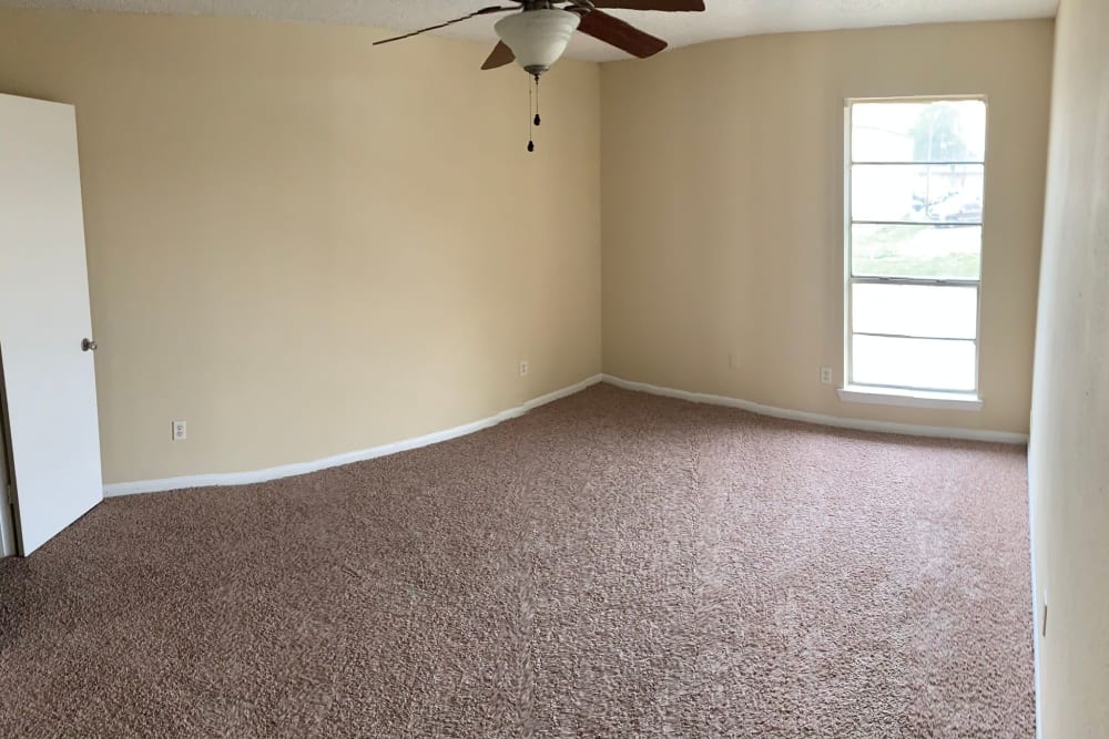 Large bedrooms at Carriage House Apartments in Nederland, Texas