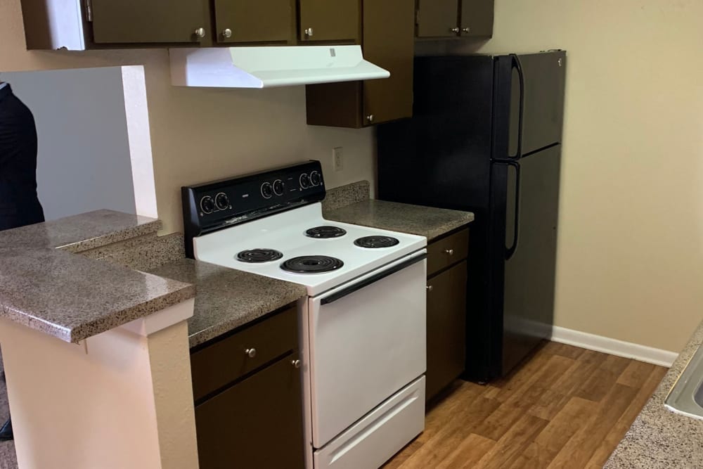 Full kitchens at Carriage House Apartments in Nederland, Texas