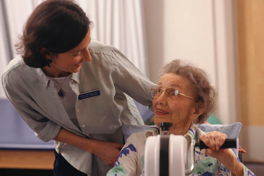 Resident working on arm strength at Belle Reve Senior Living in Milford, Pennsylvania