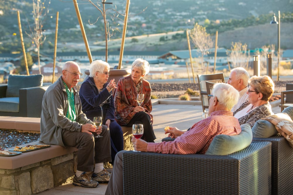 Residence enjoying day on deck at Touchmark at The Ranch in Prescott, Arizona