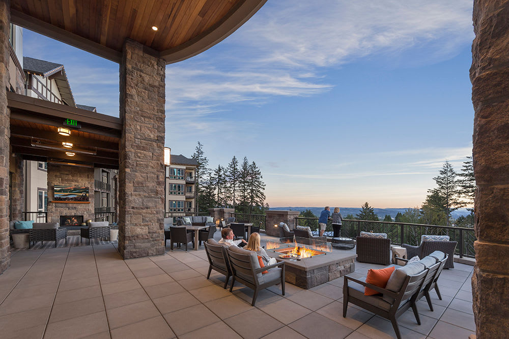 Residents taking in the view from the balcony at Touchmark in the West Hills in Portland, Oregon