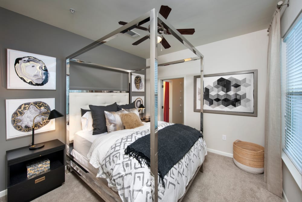 Carpeted bedroom with a ceiling fan at City View Vinings in Atlanta, Georgia