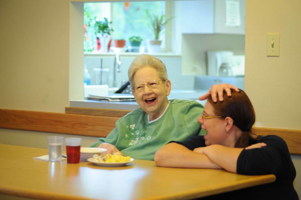 A patient having fun with their caretaker at Chandler House in Yakima, Washington