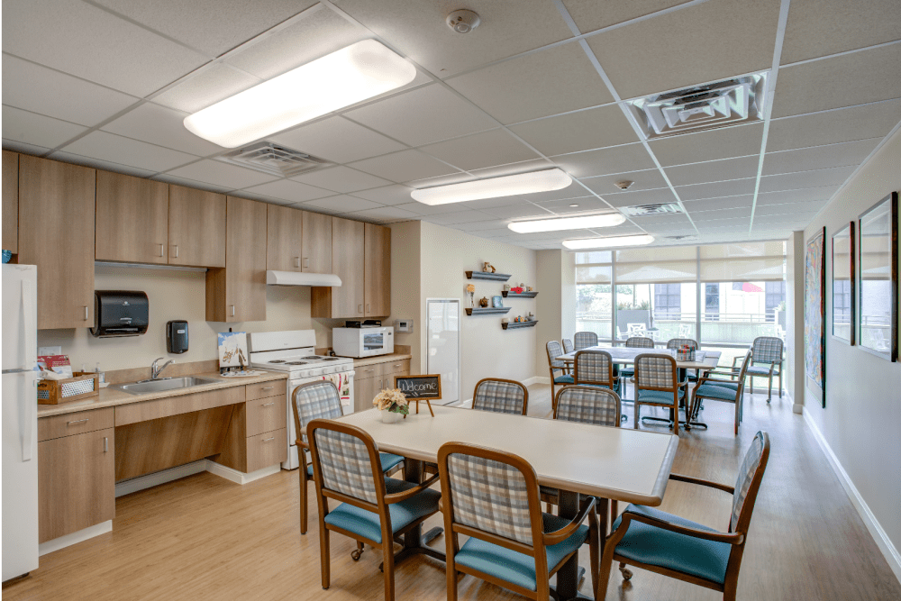 Kitchen and activity room at The Village of River Oaks in Houston, Texas